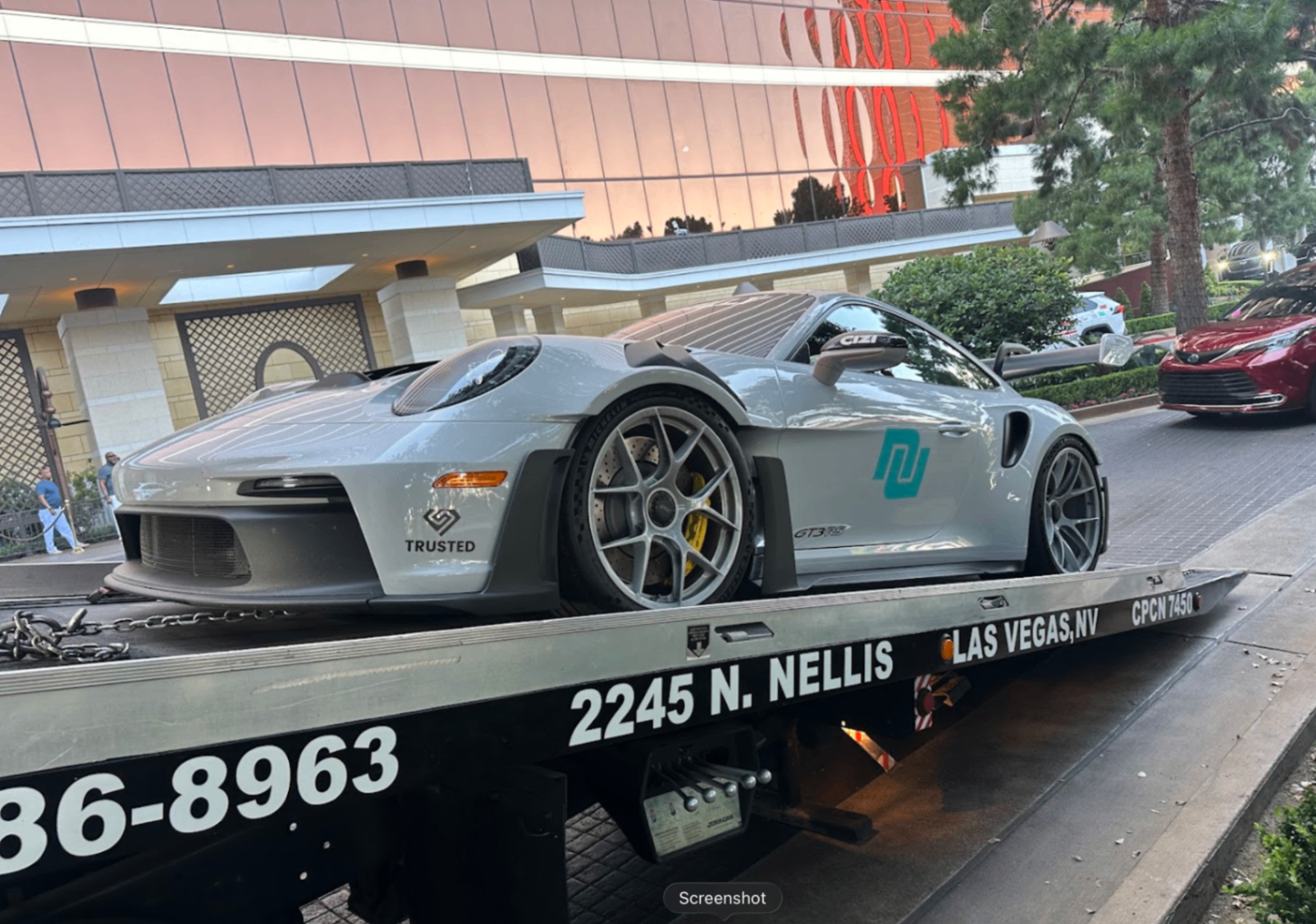 Porsche 911 GT3 RS loaded on Reggie's flatbed on the Las Vegas Strip
